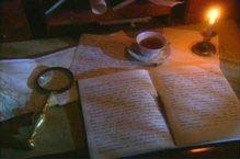 Photograph of books and papers on a desk